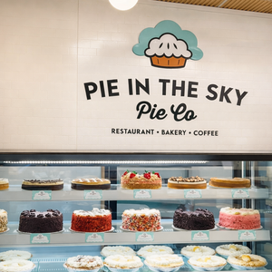Pie in the Sky Pie Co. bakery shop interior with shelves of handcrafted pie gift boxes and baked goods, delivered nationwide.